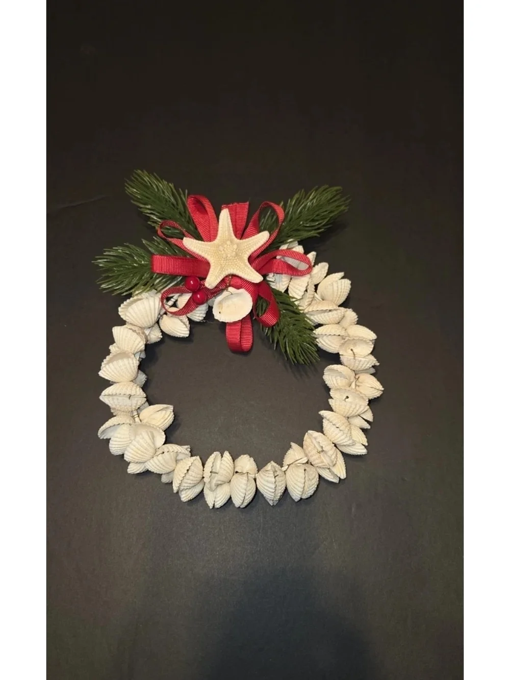 Handcrafted White Shell Holiday Wreath with Red Ribbon